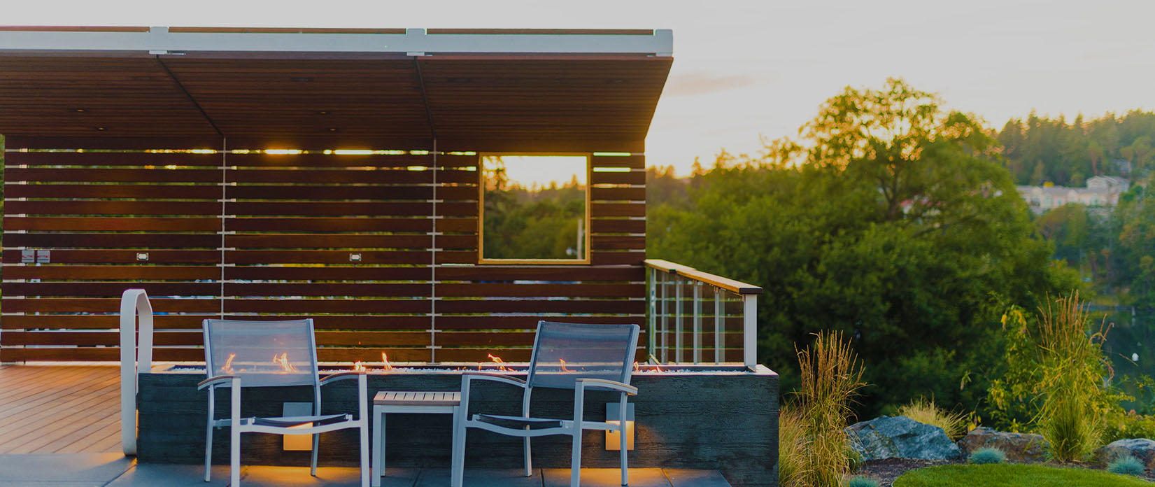 outdoor fireplace and chairs