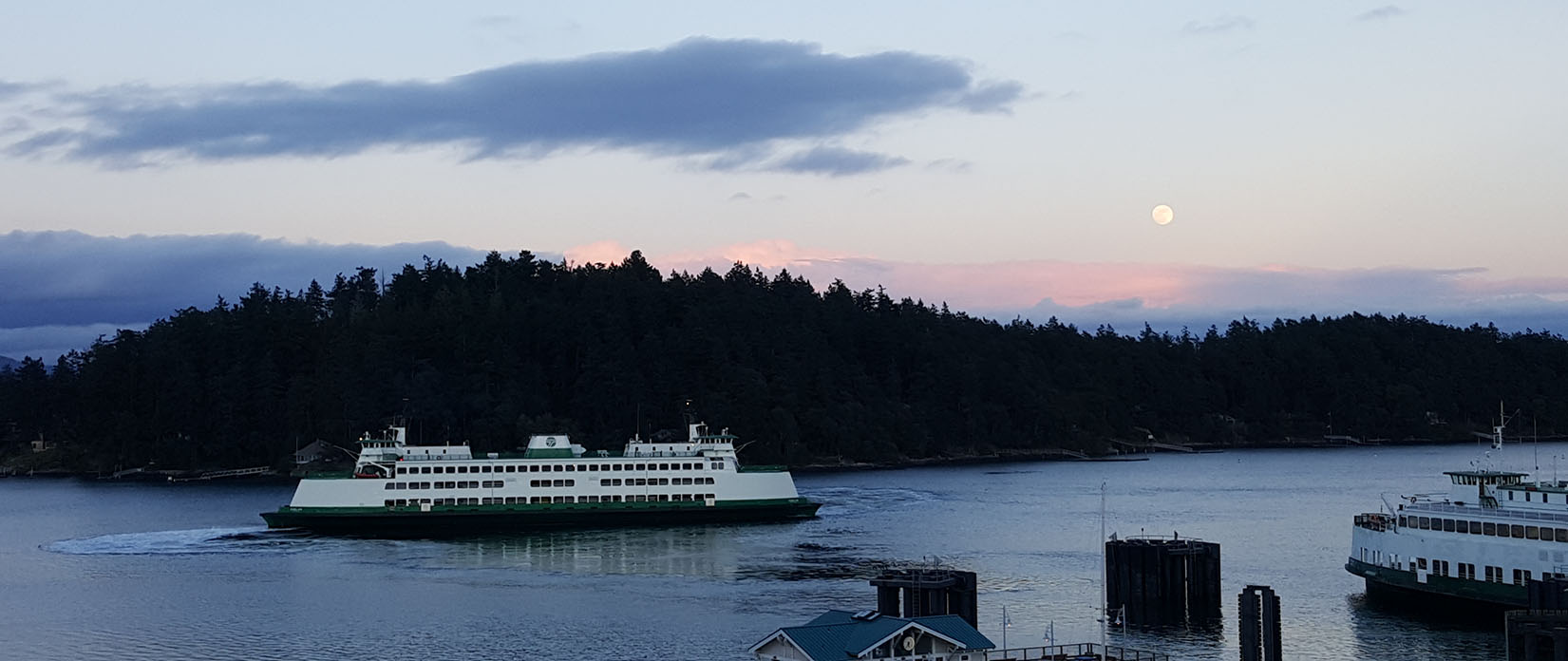 ferry at sunset